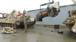 Soldiers, contractors perform maintenance on 4-118th CAB equipment in preparation for deployment