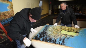 Cold War-era wall mural comes down