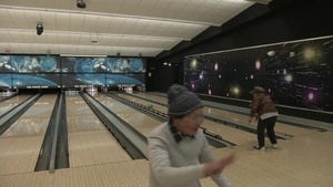 Members of MCAS Iwakuni bowl with Japanese residents (B-Roll)