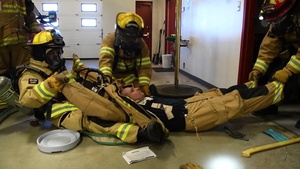 Firefighters conduct rapid intervention training