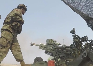 US Soldiers and Royal Thai Army Soldiers train together on field artillery during Cobra Gold