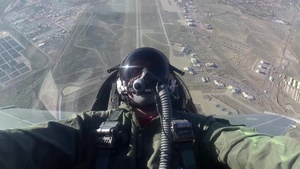 F-35 Demo Team's TSgt Couture Reenlists in F-16
