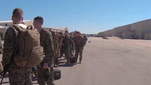 U.S. Marines with 14th Marine Regiment, 4th Marine Division prepare to depart for exercise Dynamic Front