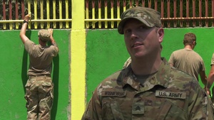Soldiers help paint Santa Juliana Elementary School in the Philippines
