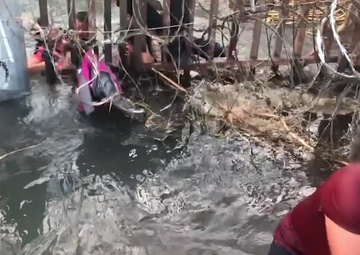 Smugglers Push Family Units Under Border Fence