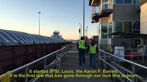 First tow of the season advances past Lock and Dam 2 to the Port of St. Paul