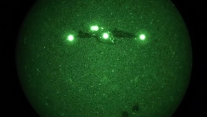 U.S. Army Paratrooper conduct night operations during Operation Devil Storm