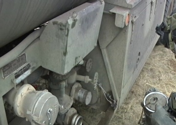 Canadian and U.S. Soldiers Conduct a Refuel Mission