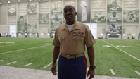 Sgt. Maj. Green addresses the Marines vs. Navy flag football game during Fleet Week NY