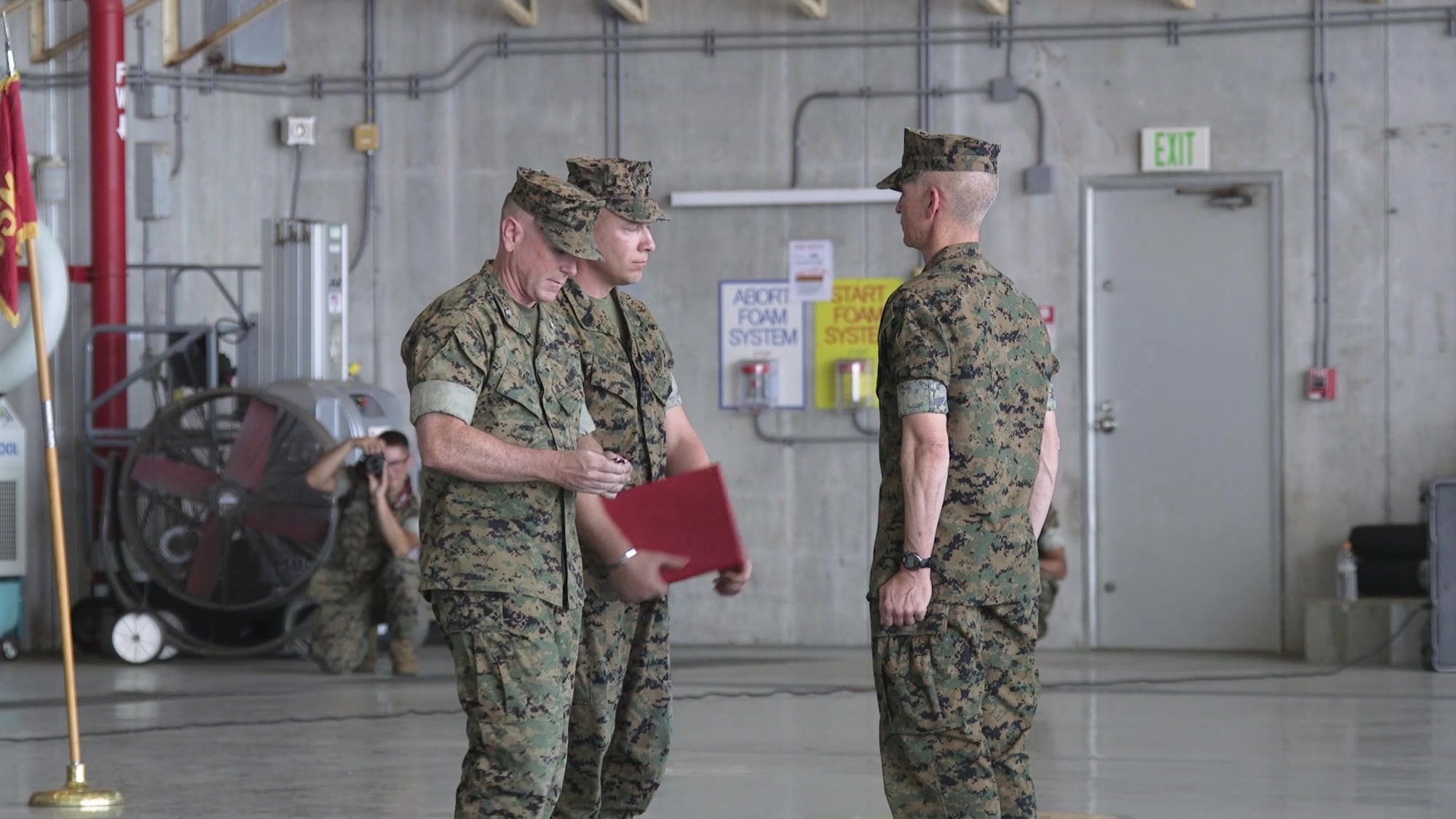 Marines and families with Marine Wing Support Squadron 172, Marine Aircraft Group 36, 1st Marine Aircraft Wing, participate in a change of command ceremony May 23, 2019, on Marine Corps Air Station Futenma, Okinawa, Japan. The Change of Command ceremony represents the transfer of responsibility, authority and accountability from the outgoing commanding officer, Lt. Col. Prescott N. Wilson, to the incoming commanding officer, Lt. Col. James S. Pryor. (U.S. Marine Corps video by Lance Cpl. Ryan Persinger)