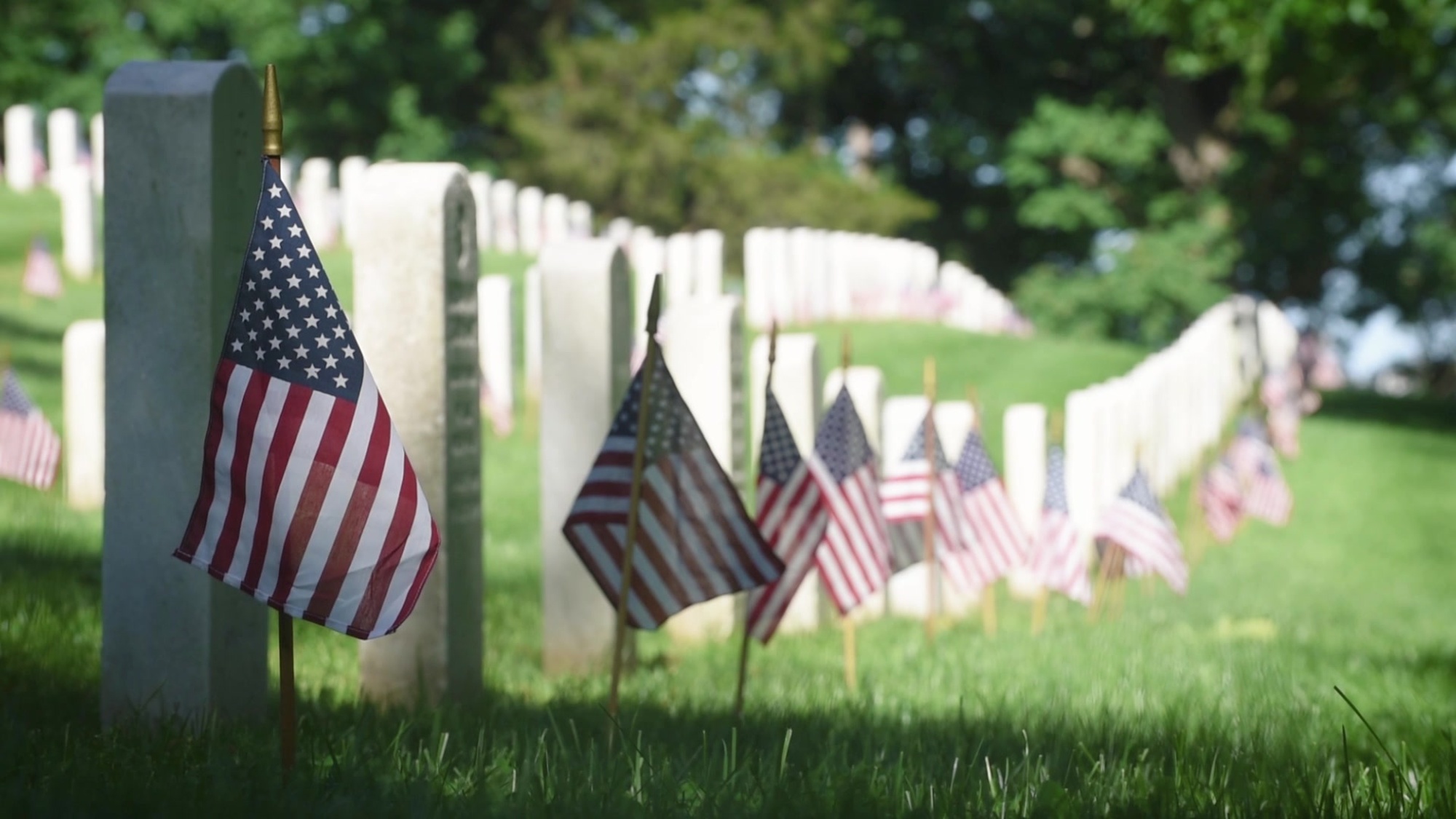 190524-N-YG104-0002 ARLINGTON, Va. (May 24, 2019) 250,000 American flags are placed at the foot of every headstone in the Arlington National Cemetery for Memorial Day Weekend. Arlington National Cemetery has evolved from a place of necessity to a national shrine to those who have honorably served our Nation during times of war – including every military conflict in American history – and during times of peace. The cemetery is the final resting place for service members, veterans and their families. “Service to country” is the common thread that binds all who are honored and remembered here. (U.S. Navy video by Mass Communication Specialist 1st Class Sarah Villegas)