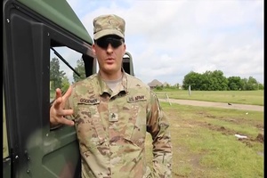 Oklahoma Army National Guardsmen fill sandbags during historic flooding