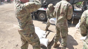 Arkansas National Guard Soldiers Help Fill Sandbags in Dardanelle, Arkansas