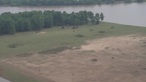 Arkansas National Guard Airlifts Hay Bales to Stranded Cattle