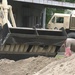Missouri Guardsmen work with local civilians to sure up a levee.