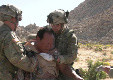 Combat medics practice battlefield medical simulations during training exercises