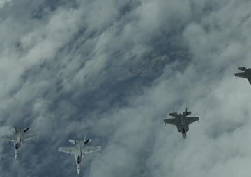 Aircraft fly in formation