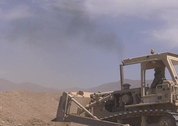 Mine Clearing Line Charge (MICLIC) on Assault Breacher Vehicle excersie b-roll