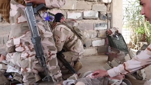 French and ISF soldiers execute a simulated medical training exercise for MG Ghika.
