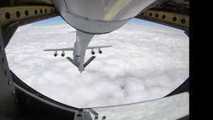 KC-135 Performs Aerial Refuel With C-5