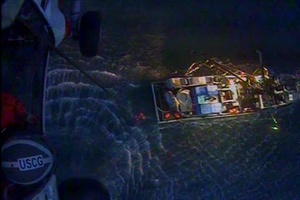 Coast Guard delivers pump to vessel taking on water, Prince William Sound, Alaska