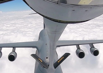 KC-135 Performs Aerial Refuel With C-5