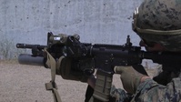 SPMAGTF-CR-AF Marines execute an iron-sights rifle range