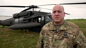 Army National Guard UH-60 Black hawk crew prepares for a flight to support the IRT