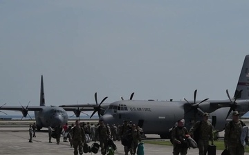 Deployed 143d Airlift Wing Airmen Return on Independence Day