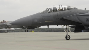F-15 Strike Eagle Aircraft Land in Poland