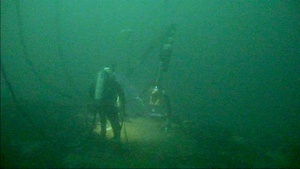 Deep-Water Diver Fits a Pumping System to Recover Oil from the Coimbra Shipwreck
