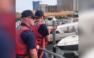 Coast Guard Station Atlantic City Members Fight Boat Fire