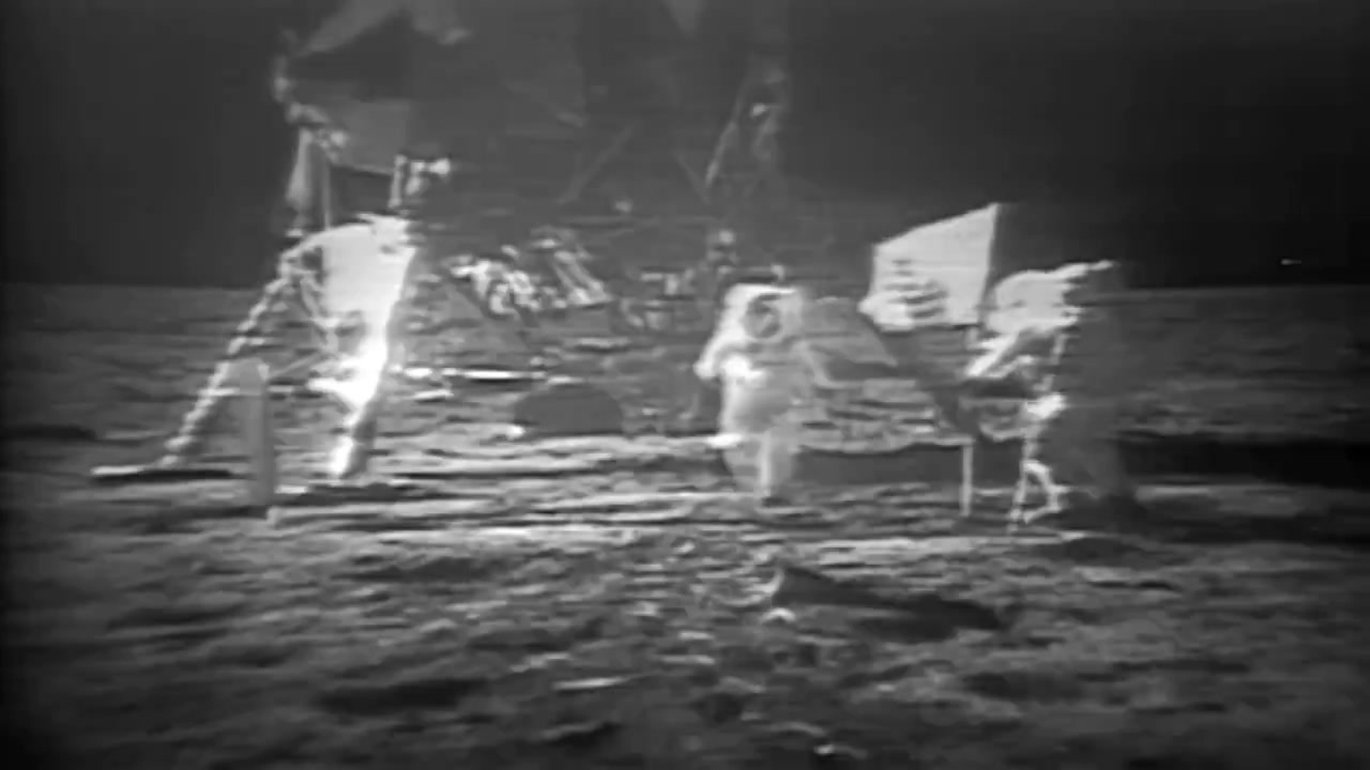 Astronauts walk on the moon during the Apollo 11 mission