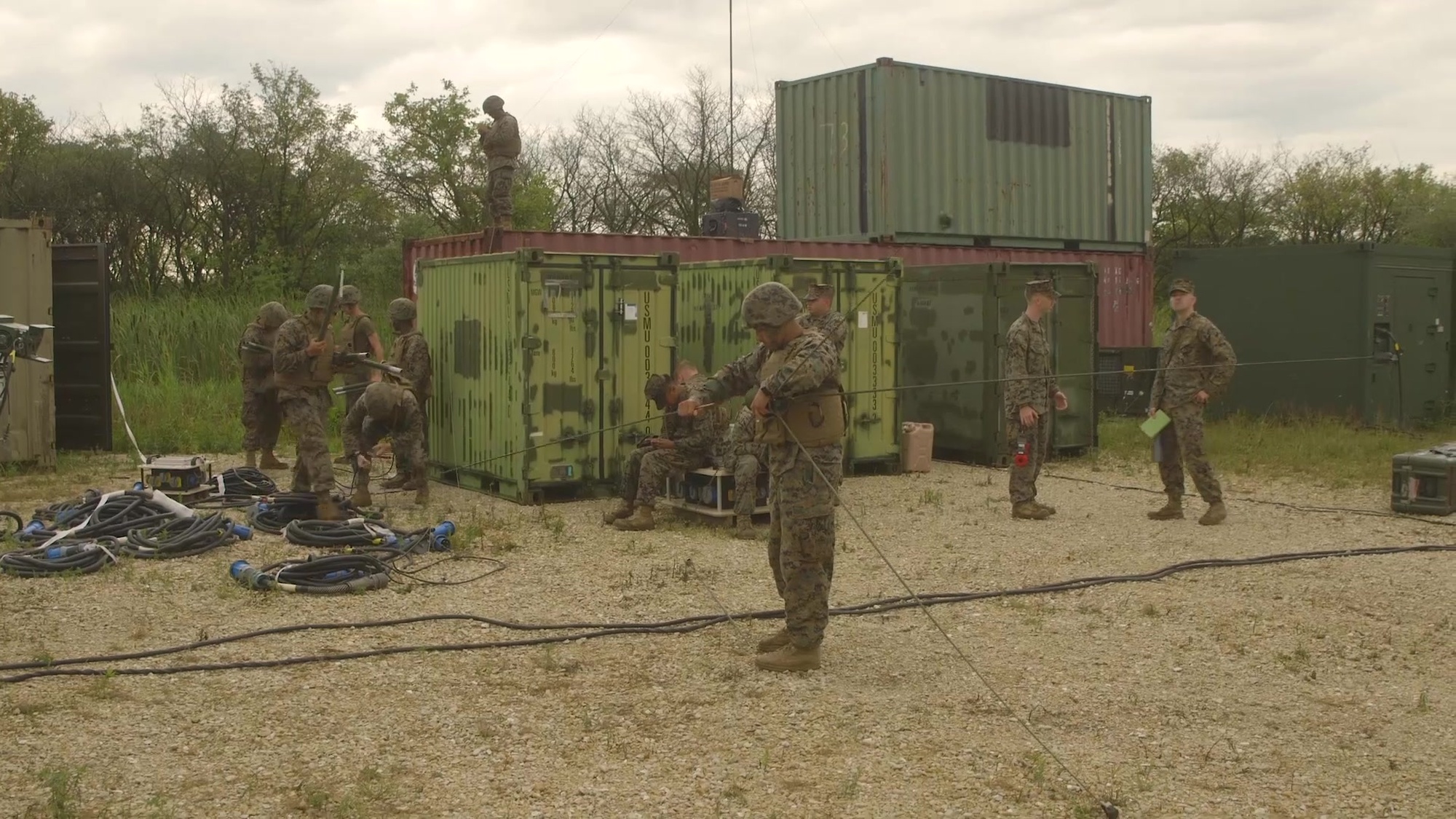 U.S. Marines with Marine Wing Communication Squadron 48, Marine Aircraft Group 48, 4th Marine Aircraft Wing, conduct a communications exercise at Joliet Army Training Area, Elwood, Ill., July 18, 2019. MWCS-48 is conducting exercises ranging from rifle and pistol qualifications to land navigation in order to meet annual training requirements, as well as increase occupational proficiency. (U.S. Marine Corps video by Lance Cpl. Faeth Webb)