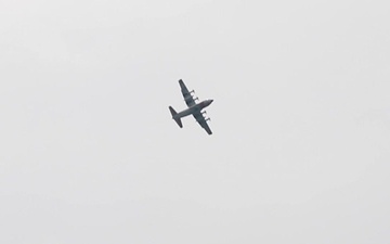 USCG HC-130 Hercules conducts a flyover demonstration for scouts at the 2019 World Scout Jamboree