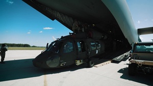 Joint Team Works Together to Transport Black Hawks on C-17