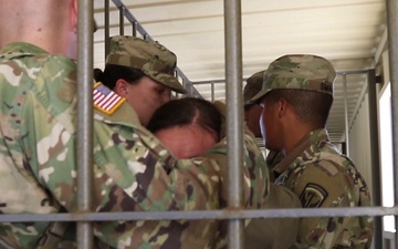 (Broughey) B-roll and Interview 328th Military Police Company Conducts Detainee Cell Extraction Training on Tactical Training Base Kelley