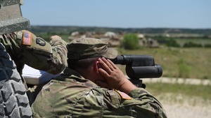 Abrams and Bradleys conduct test fires