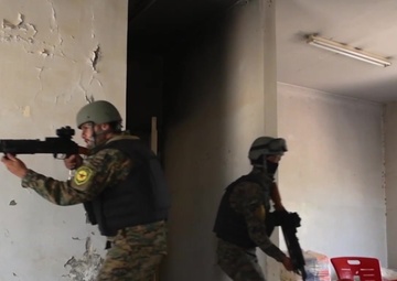 Coalition Soldiers Train SDF in Military Operations in Urban Terrrain