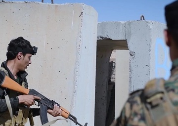 Coalition Soldiers Train SDF Commandos on Stress-Fire