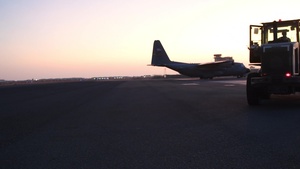C-130 Night Ops Cargo and Passenger Loading B-roll