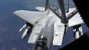 Archive B-Roll: C-135s from the 141st Air Refueling Wing conduct mid-air refueling of F-15 aircraft from the 142nd Fighter Wing.