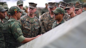 Brazilian Marines demonstrate water purification techniques to US Marines during multinational exercise