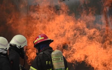 USAFE Fire Academy conducts joint firefighter training (Slow Motion BROLL)