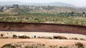 Aerial Video of Wall Conctruction Near Tecate, CA