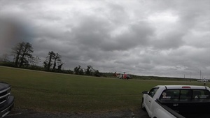 Coast Guard aircrew transports personnel and supplies to Ocracoke Island after Hurricane Dorian