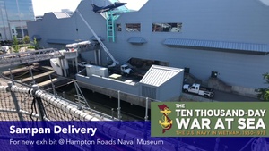 Vietnam War Era Sampan is craned and delivered to Naval Museum
