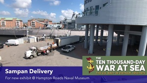 Vietnam Era Sampan is transferred onto a flatbed truck