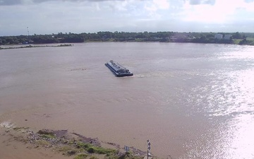 Drone footage shows barges lodged beneath I-10 bridge