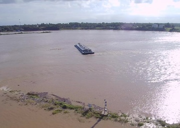Drone footage shows barges lodged beneath I-10 bridge